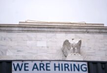 US Economy Adds 130,000 New Jobs, Unemployment Rate Dips to 4.3 Percent The Federal Reserve in Washington on Jan. 6, 2026.