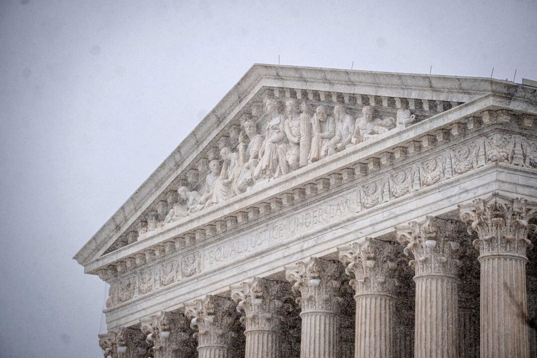 Snow falls outside of the Supreme Court in Washington on March 2, 2026.
