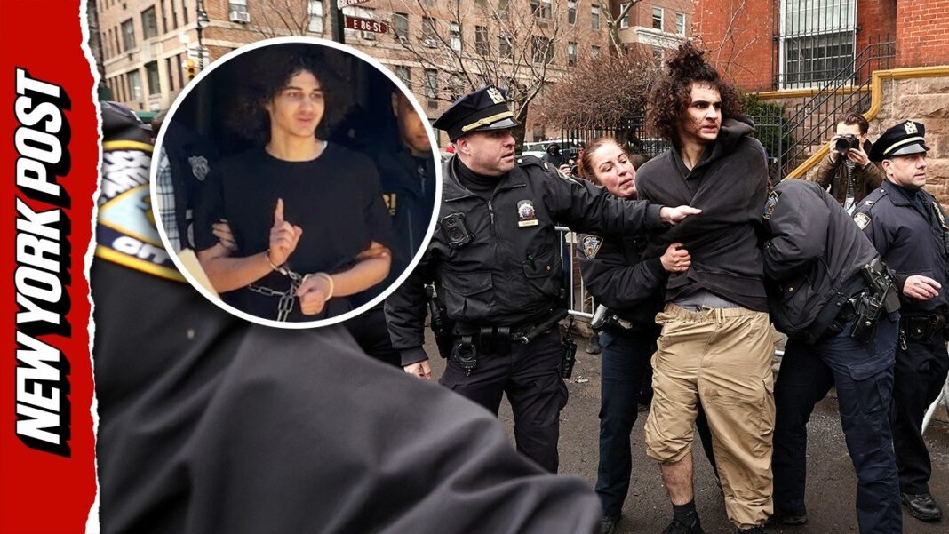 Gracie Mansion bomber flashes ISIS salute while being led in shackles from precinct
