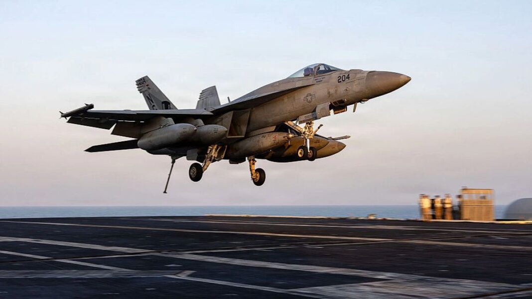 an F/A-18E Super Hornet, attached to Strike Fighter Squadron.