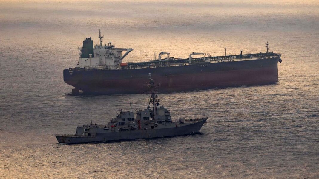 USS Rafael Peralta (DDG 115) enforces a maritime blockade against an Iranian-flagged ship attempting to sail toward an Iranian port, on April 24, 2026.