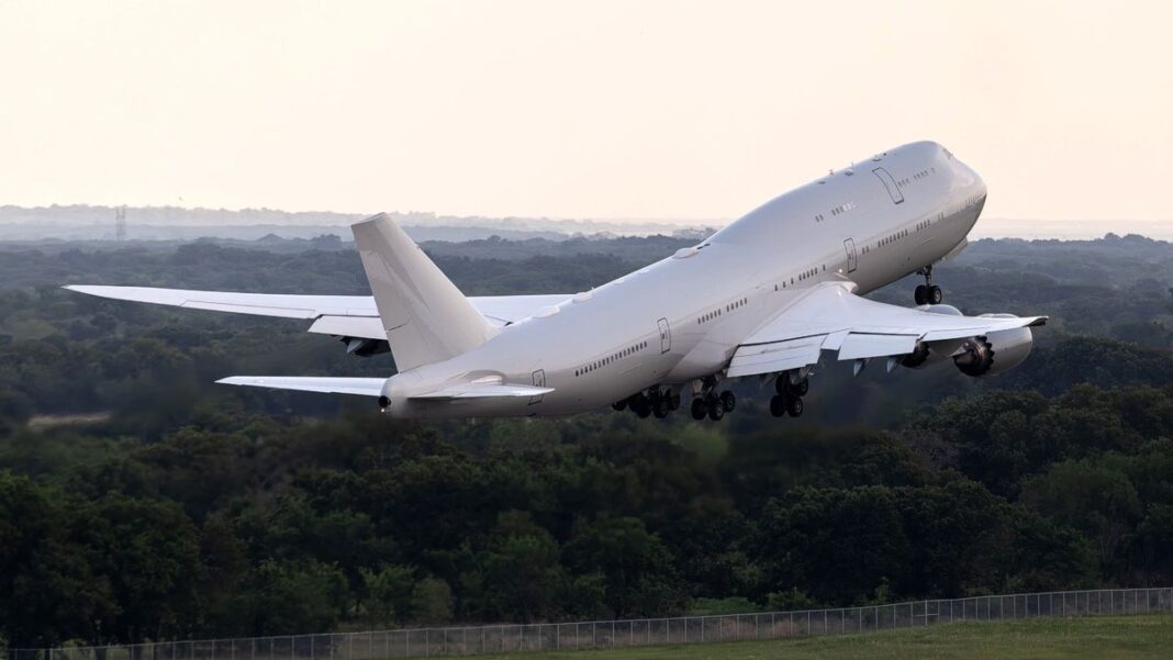 The VC-25B Bridge aircraft takes off for a flight test at Greenville, Texas.