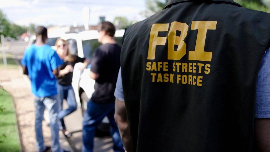 FBI agents in photo.